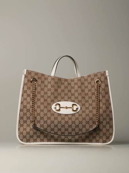 gucci all ingrosso|white gucci shopping bag.